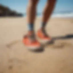 Stylish surf shoes on a sandy beach