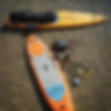 Safety gear and equipment laid out for paddle boarding