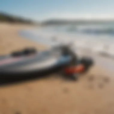 Essential surfing gear laid out on a sandy beach, ready for a day of surfing