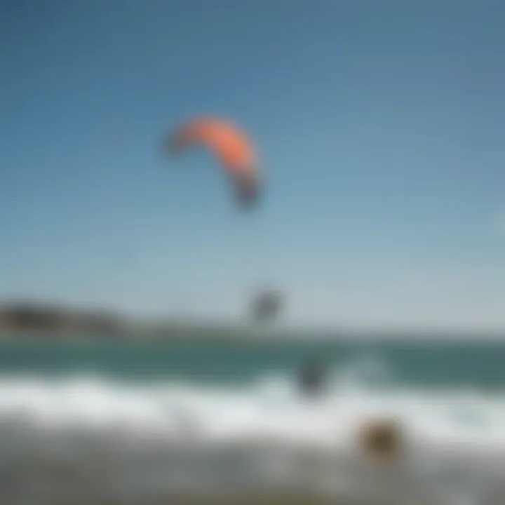 Group of enthusiasts enjoying a kiteboarding event with cheering spectators.