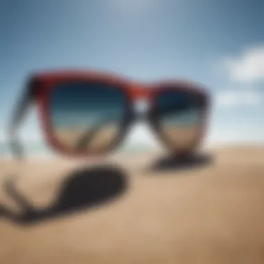 A selection of top brands for surfing sunglasses displayed on a beach