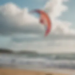 A vibrant trainer kite soaring high in the sky with a scenic beach backdrop