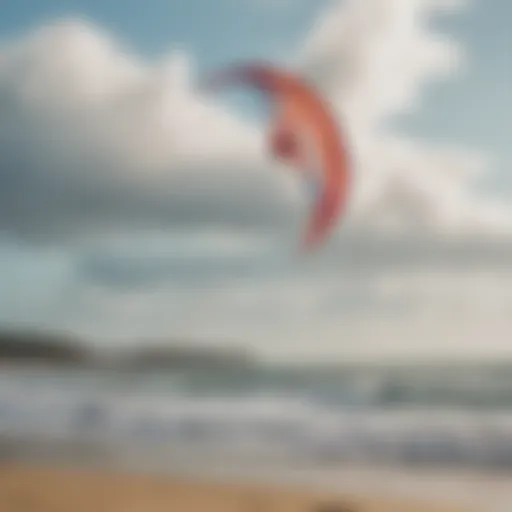 A vibrant trainer kite soaring high in the sky with a scenic beach backdrop