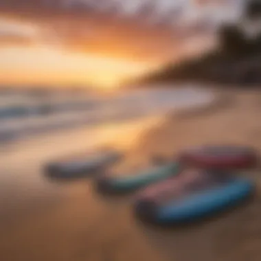 A serene sunset view at the beach with boogie boards lined up ready for use