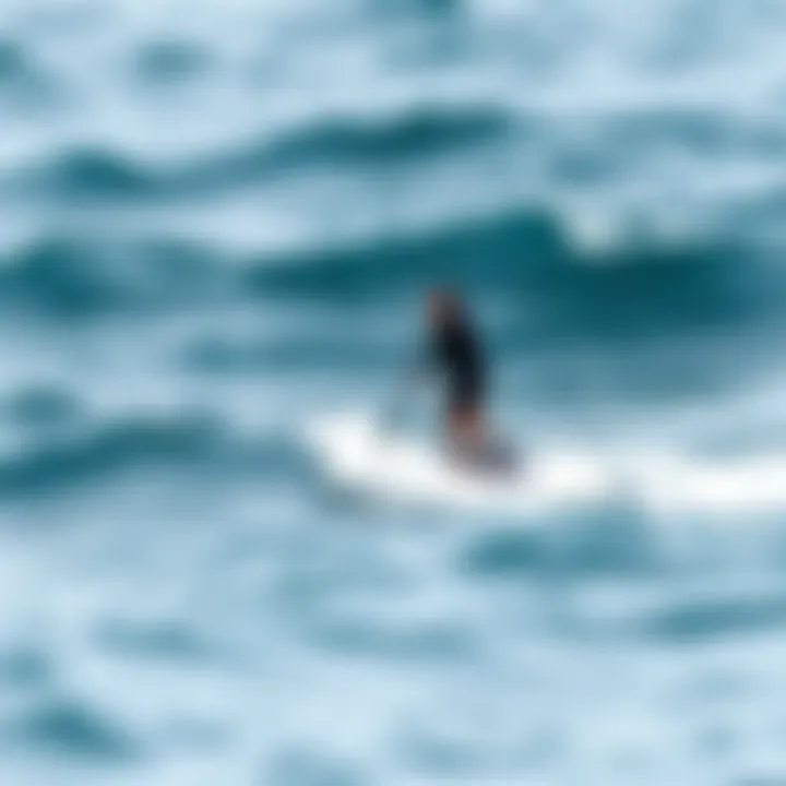 An electric stand-up paddle board navigating through rough waves