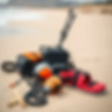 A close-up of essential kitesurfing gear laid out on the sandy beach ready for adventure.