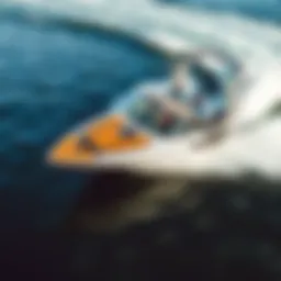 A sleek wake boat cutting through the water