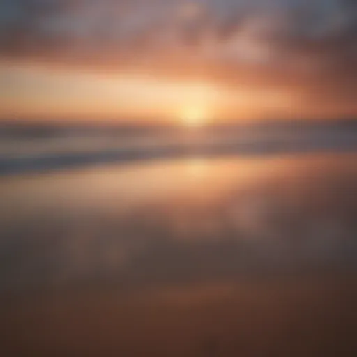 A serene view of Scheveningen Beach at sunset highlighting the calm waters and sandy shore.