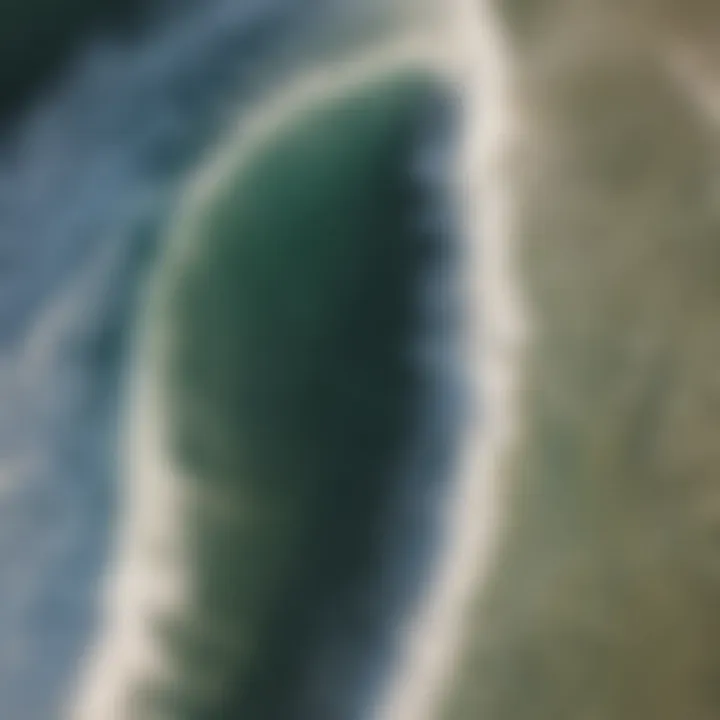 An aerial shot of a pristine surf break with perfect waves