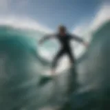 Dynamic view of a surfer riding a wave on a Ben Gravy surfboard