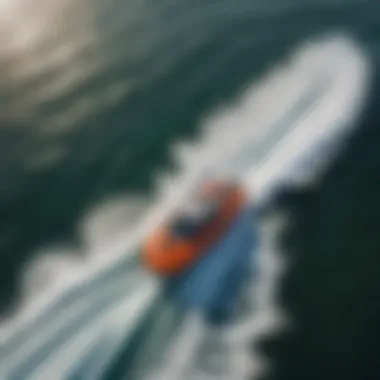 An aerial view of a hydro foiler carving through waves in a vibrant ocean setting.