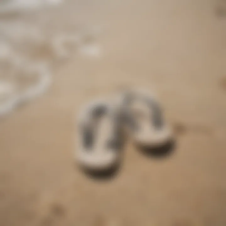 Salty flip flops on a sandy beach