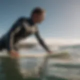 Surfer demonstrating proper neck alignment on the board