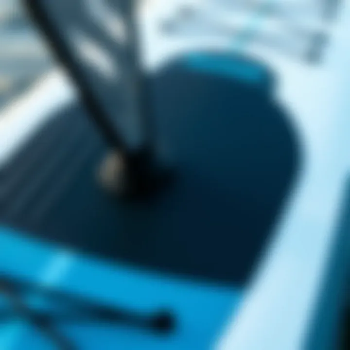 Detail of Foil Attachment on SUP Board Close-up of the foil attachment area on a used SUP board