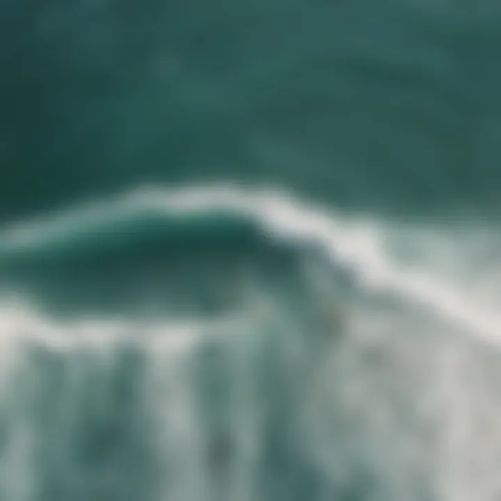 An aerial shot of a group of surfers in the ocean, showcasing camaraderie