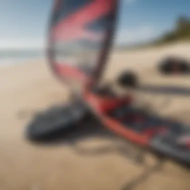 Essential kite surfing gear laid out on the beach