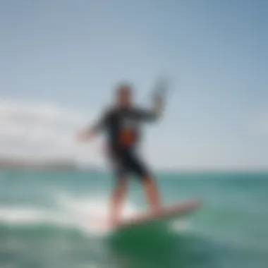 A kitesurfing lesson taking place with an instructor and student on the water