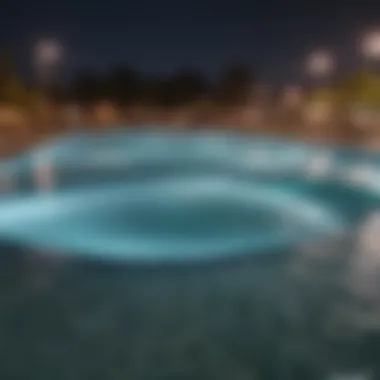 An evening scene of the wave pool illuminated, creating a vibrant atmosphere for nighttime activities.