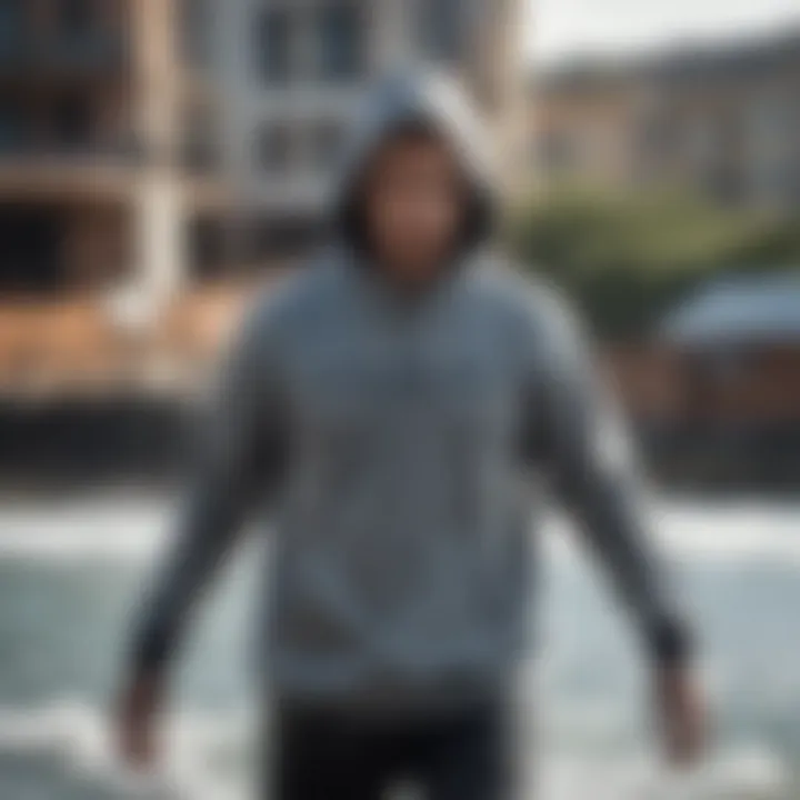 Athlete wearing the hoodie in a dynamic watersport setting