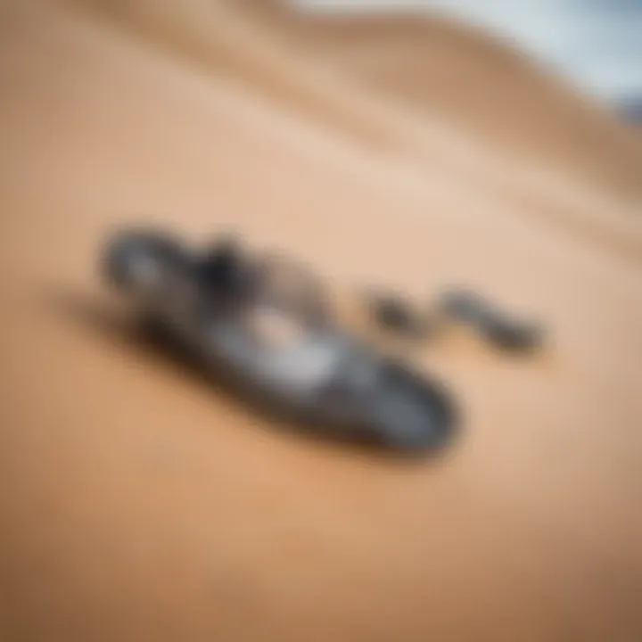 A close-up of essential sandboarding gear laid out