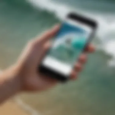 Close-up of a surfer checking surf app on a smartphone