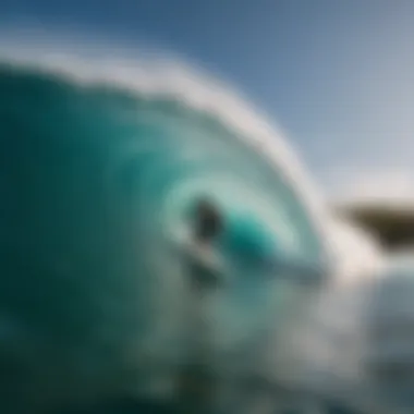 A surfer riding a perfect wave in Cinnamon Dhonveli, capturing the thrill and energy of the surfing experience.