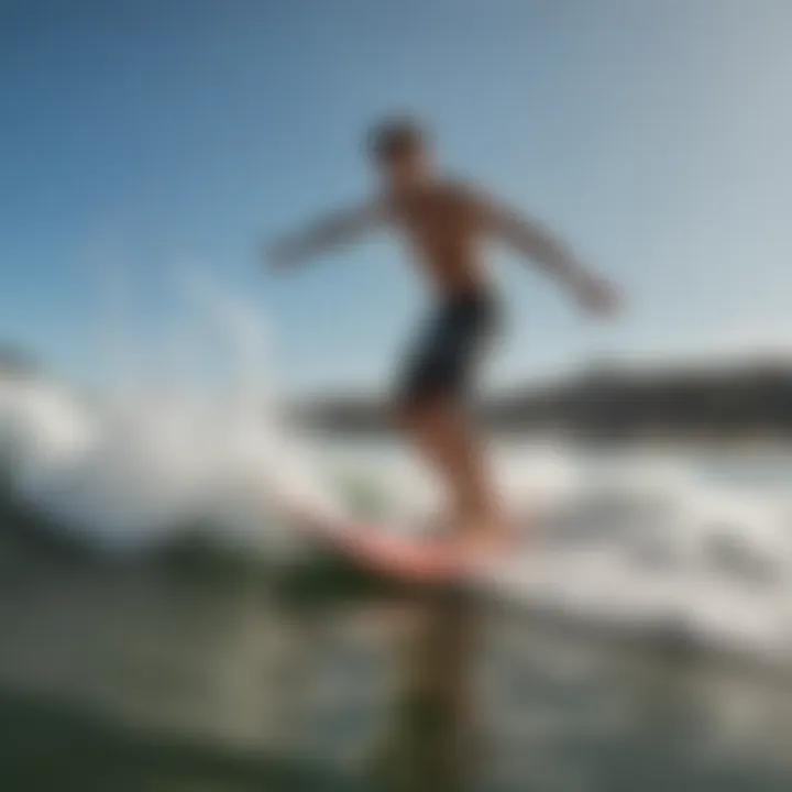 Skimboarder performing tricks on the water