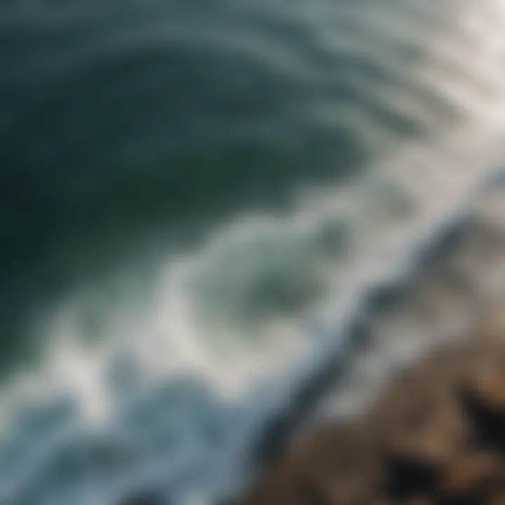 A peaceful ocean view from above, showcasing the interplay of light and water.