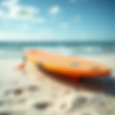 A vibrant boogie board on a sandy beach